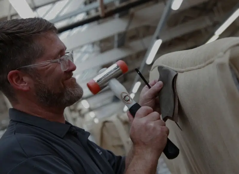 Upholsterer at work