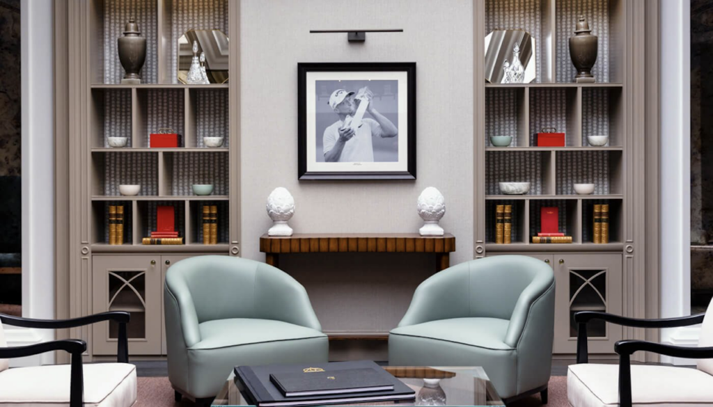 Pale blue upholstered lounge chairs in a tailored clubhouse interior