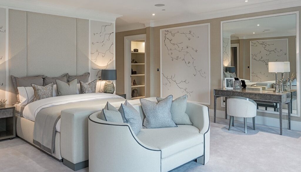 Bespoke curved sofa and bedroom seating in a luxury Surrey residence